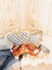 Lil Kim On the Sofa