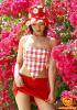 Lily Kwan Srrounded By Flowers