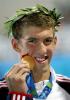 Michael Phelps Holding his Gold Medal