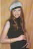 Michelle Trachtenberg Wearing a Cap