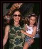 Mimi Rogers Carrying A Child