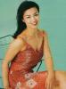 Ming Na Wen Sitting Smiling