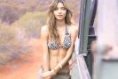 Miranda Kerr Standing with the Jeep