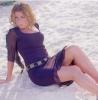 Nikki Sanderson Sitting on the Sand