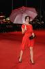 Parker Posey in a red dress