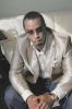 Puff Daddy in a Sitting Pose