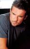Side pose of Dominic Purcell