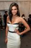 Sonia Vera in a white dress