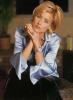 Tea Leoni in a Sitting Pose