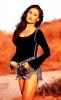 Tia Carrere in a Standing Pose