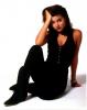 Tiffani Thiessen in a Sitting Pose
