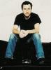 Tim Roth in a Sitting Pose