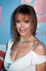 Tina Louise in a white dress