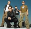 U2 in a Sitting Pose
