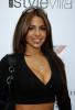 Vida Guerra in a Standing Pose