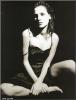 Virginie Ledoyen Sitting in a Strapy Dress