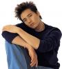 Won Bin in a Sitting Pose
