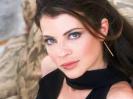 Yasmine Bleeth on Bed