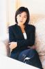 Yoon jin Kim in a Sitting Pose