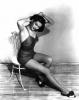 Yvonne De Carlo Tieing her Hair