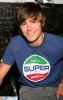 Zac Efron in a Sitting Pose