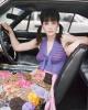 Zooey Deschanel in a car