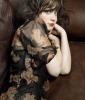 Zooey Deschanel on the bed
